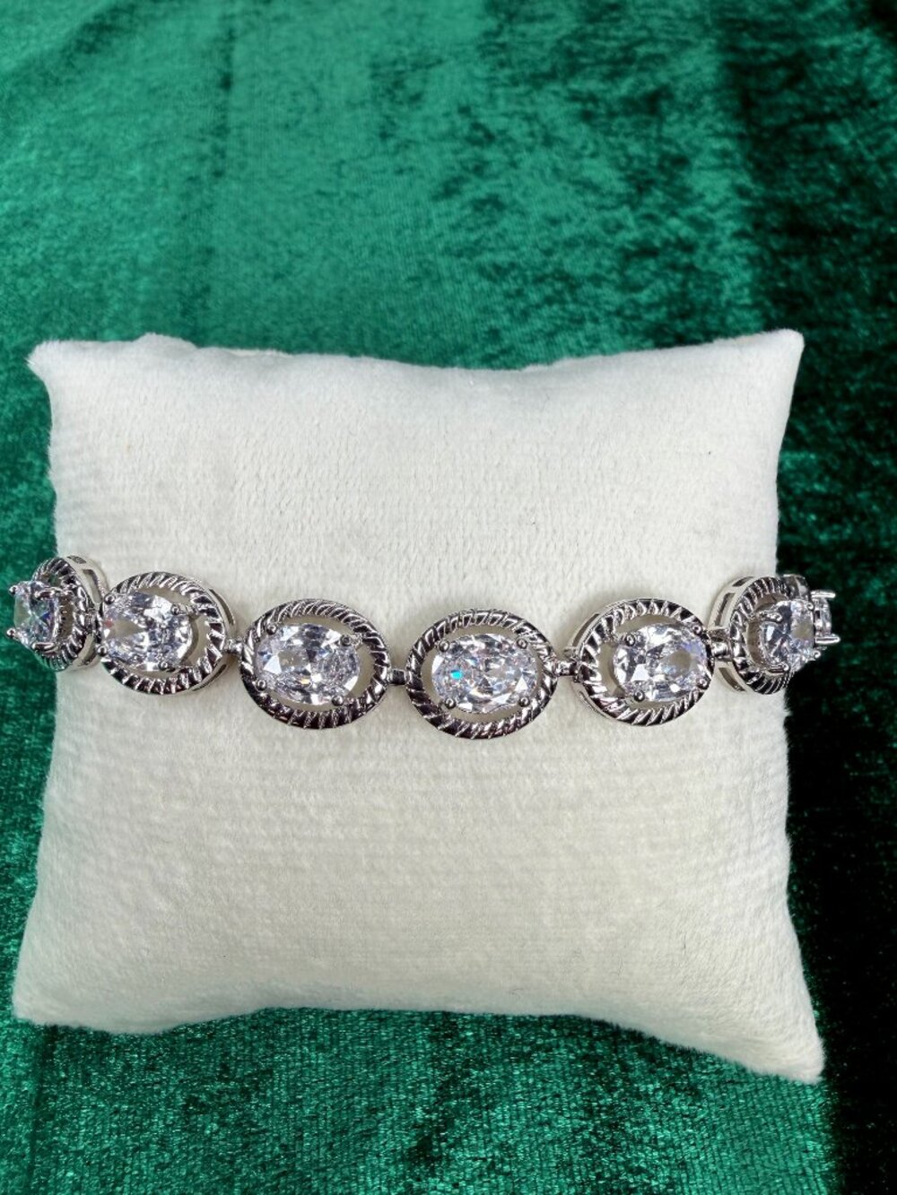 14 Karat White Gold Plated Simulated Clear Oval Bracelet